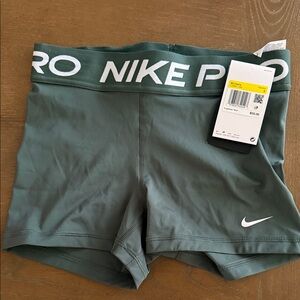 Nike Women's Pro Athletic Shorts in Olive Green